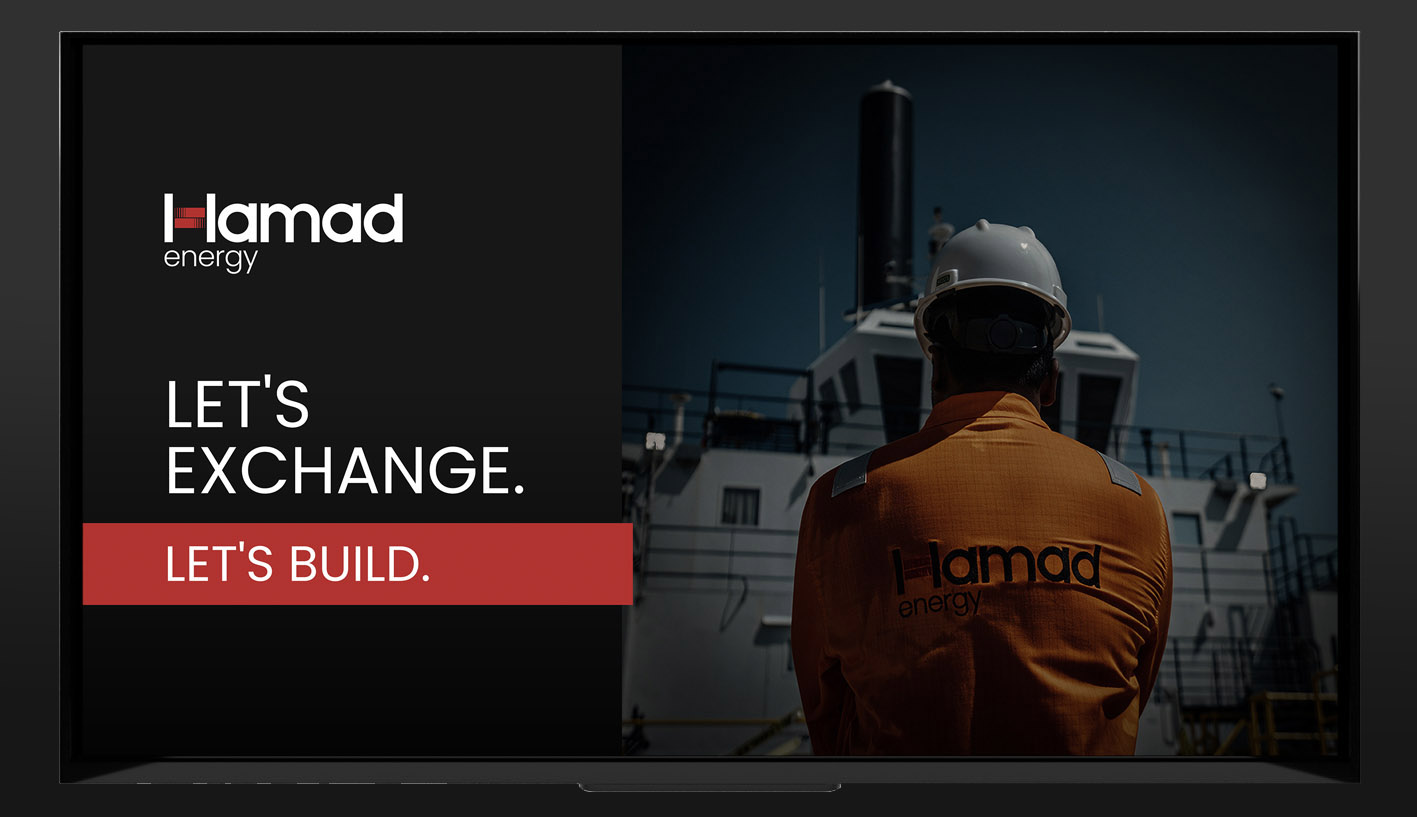 Hamad Energy exhibition screen graphic featuring offshore operations imagery and the message Let's Exchange. Let's Build.